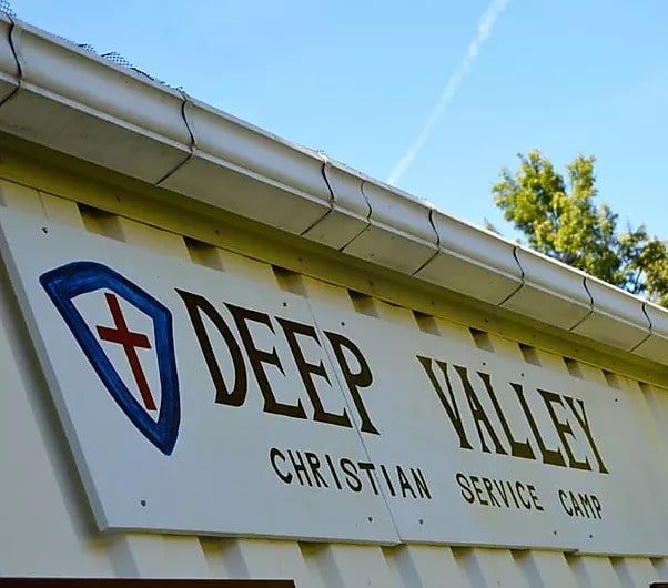 The Deep Valley sign on the white building